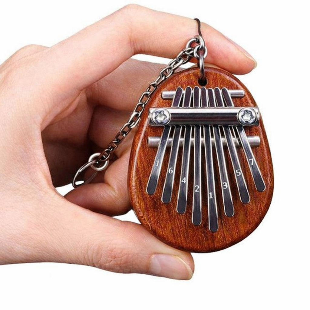 8 Key exquisite Finger Thumb Piano Keychain